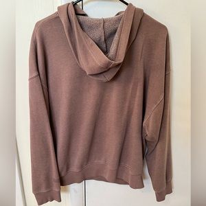Small hoodie from PINK. Color light brown.